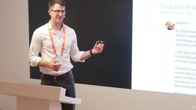 A capture from the Ubuntu Summit 26.04 Opening Keynote
video, where I'm presenting on the Future of AI in
Ubuntu.